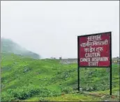  ?? COURTESY: WANG CHEN ?? At the corner of the road leading to Doklam, a signboard read: “Caution: Chinese observatio­n starts.”