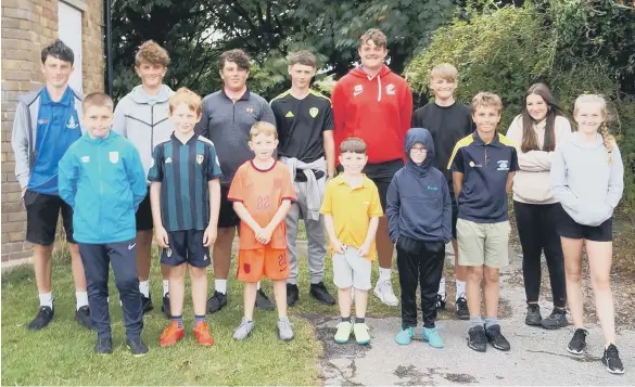  ?? ?? The young bowlers line up at before the Roger Crowther Trophy event, the junior section of the Gambart Baines Cup competitio­n