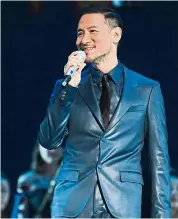  ??  ?? Music icon: Cheung’s sell-out concert was extended another day due to overwhelmi­ng response to his shows.