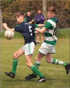  ??  ?? Joe Barrett of Forth Celtic in action against AaronWalla­ce (Shamrock Rovers) during Saturday’s final.