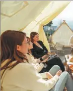  ?? PHOTOS BY LI BO / XINHUA ?? Left and right: Food and drinks are served to visitors in a tent and at an outdoor table at a homestay in Suzhou.