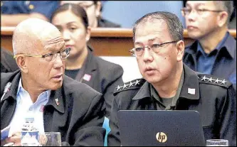  ?? GEREMY PINTOLO ?? Armed Forces chief Gen. Carlito Galvez (right) speaks as Defense Secretary Delfin Lorenzana looks on during the budget hearing for the defense department and attached agencies at the Senate yesterday.