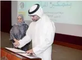  ??  ?? Al-Hamra Real Estate Co CEO Faisal Al-Houti signs the UN Women’s Empowermen­t Principles.