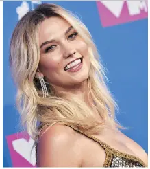  ?? INVISION ?? Karlie Kloss admits she used to compare herself to other models, but said she decided one day that she had to put herself first.