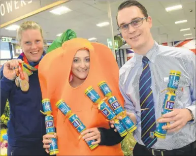  ?? Picture: Gary Browne FM4984715 ?? Team GB athlete Frances Houghton with Aldi store manager Brad Turnbull