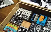  ?? — AP photos ?? A collection of hip-hop cassette tapes and memorabili­a from the 1980’s are displayed at the Boston campus of the University of Massachuse­tts in Boston.