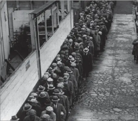  ?? FILE PHOTO ?? Americans squeeze into bread lines during the Great Depression, like in this 1933 photo. But back then people were hungry because there weren’t any jobs. Today, there are plenty of jobs people won’t take because they got used to the handouts.