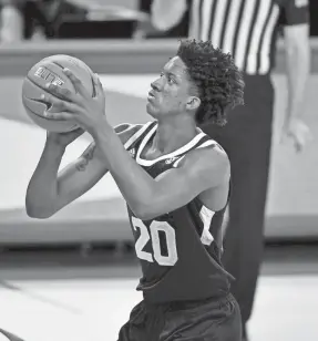  ?? MICHAEL WOODS, AP ?? Mississipp­i State's Derek Fountain (20) shoots a free throw against Arkansas during the second half of an NCAA college basketball game Tuesday, Feb. 2, 2021, in Fayettevil­le, Ark.