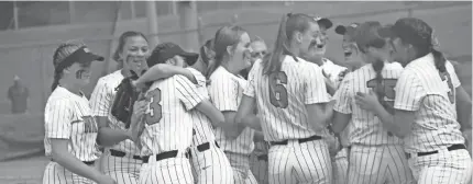  ?? BRIAN JOHNSON/SHANWEE NEWS STAR ?? North Rock Creek celebrates on field after winning its first state tournament game on Thursday.