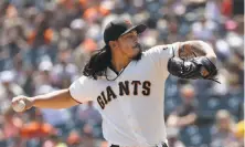  ?? Jeff Chiu / Associated Press ?? Giants rookie Dereck Rodriguez limited the Pirates to two hits in seven innings to improve to 6-1 this season.