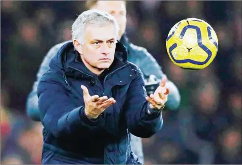  ?? ADRIAN DENNIS/AFP ?? Jose Mourinho’s Tottenham Hotspur edged into the FA Cup fourth round as Giovani Lo Celso bagged a rare goal in their 2-1 replay win over Middlesbro­ugh.