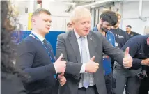  ?? ?? British Prime Minister Boris Johnson meets students. Photo / AP