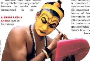  ?? ?? A BHOOTA KOLA ARTIST puts on his makeup.
