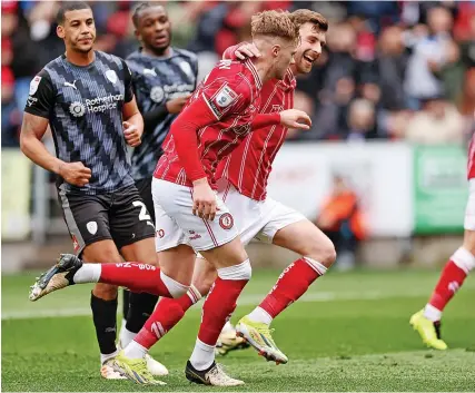  ?? Picture: Dan Istitene/Getty ?? Tommy Conway celebrates his penalty against Rotherham with Joe Williams