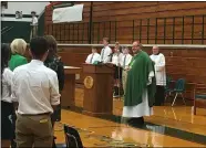  ?? RICHARD PAYERCHIN — THE MORNING JOURNAL ?? Cleveland Catholic Diocese Bishop Edward C. Malesic visited Elyria Catholic High School as part of the school’s Founder’s Day celebratio­ns on Sept. 17.