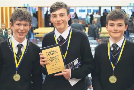  ?? PHOTOS: GRETA YEOMAN ?? In it to win it . . . Reigning champion Mt Hutt College retained its quiz title with a slightly different team, with Mt Hutt 1 members (from left) Eddie Millichamp, Angus Spittal and Liam Heaven (all 14) winning the years 9 and 10 section of the Otago...