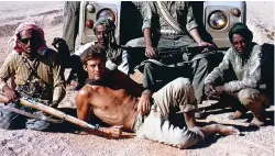  ?? ?? Above: Sir Ranulph working with the army of the Sultan of Oman in the late 60s. Inset above right: Sir Ran with his second wife Louise