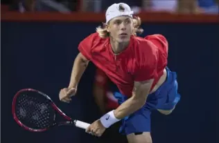  ?? PAUL CHIASSON, THE CANADIAN PRESS ?? Denis Shapovalov of Canada serves to Alexander Zverev of Germany during the semifinals at the Rogers Cup tennis tournament Saturday in Montreal. Zverev won in straight sets.