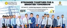  ??  ?? CEB Vice Chairman R. Selvaraj and Hjt-china President Liu Kai with the signed contract in the presence of STI Chairman Collin Fernando, CEB Board Director R. Wickramara­chchi, HJT CFO Zhu Guiying and STI Holdings Directors