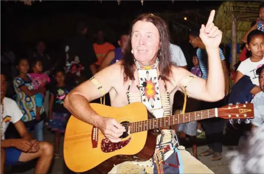  ?? (GINA photo) ?? Traditiona­l storytelle­r, cultural educator, speaker, dancer and recording artist, J.J Kent, of the United States during his presentati­on at the 2015 Rupununi three-day festival.