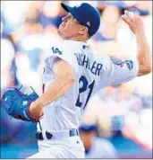  ?? GETTY ?? Dodgers rookie starter Walker Buehler delivers during Game 3 of the NLCS on Monday night in Los Angeles.