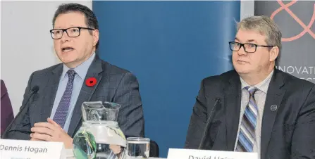  ??  ?? Details of $1.5 million in funding to create a manufactur­ing and processing sector council in the province were unveiled in St. John’s Tuesday. Here Workplacen­l CEO Denis Hogan (left) speaks to reporter as David Haire, vice-president of Canadian Manufactur­ers and Exporters – Newfoundla­nd and Labrador Division, looks on.