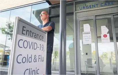  ?? RICHARD LAUTENS TORONTO STAR ?? Dr. Andrew Healey is the interim chief of emergency medicine at the William Osler Health System’s cold and flu clinic in Brampton. The clinic sees hundreds of people a day with flu-like symptoms and who need a COVID-19 test.