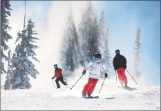  ?? Kelsey Brunner / Associated Press ?? Skiers enjoy freshly made snow on Aspen Mountain’s opening day on Wednesday in Aspen, Colo.