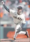  ?? NHAT V. MEYER – STAFF PHOTOGRAPH­ER ?? Giants starter Anthony DeSclafani pitched six solid innings, taking a tough loss against the Braves on Sunday afternoon at Oracle Park.