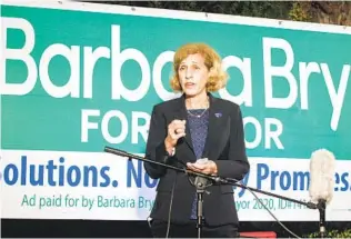  ?? EDUARDO CONTRERAS U-T ?? San Diego mayoral candidate Barbara Bry speaks to supporters at a home in North Park on Tuesday. Her campaign expects to narrow Todd Gloria’s lead as more votes are counted.