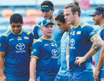  ?? INFLUENTIA­L ROLE: Cowboys coach Paul Green ( centre) directs his players during training. Picture: EVAN MORGAN ??