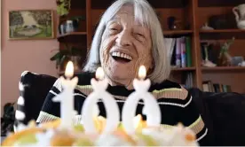  ??  ?? Agnes Keleti with a birthday cake at her home in Budapest. ‘These 100 years felt to me like 60,’ Keleti said the Hungarian hailed as the Queen of Gymnastics. Photograph: Tamás Kovács/ EPA