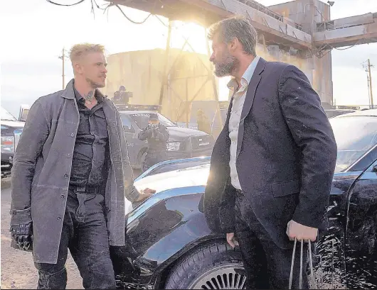  ?? COURTESY OF BEN ROTHSTEIN/TWENTIETH CENTURY FOX ?? Boyd Holbrook, left, and Hugh Jackman in a scene from “Logan.”