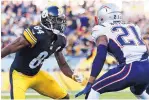  ?? JARED WICKERHAM/AP FILE ?? Steelers wide receiver Antonio Brown (84) lines up against New England cornerback Malcolm Butler (21) earlier this season.