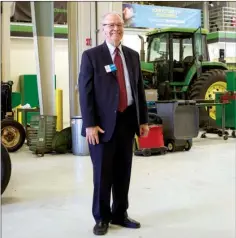  ?? FILE PHOTO ?? ASU-Beebe Chancellor Eugene McKay stands in the shop that is used for the college’s John Deere program, the only such program in Arkansas.