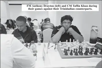  ?? ?? FM Anthony Drayton (left) and CM Taffin Khan during their games against their Trinidadia­n counterpar­ts.