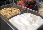  ?? DIGITAL FIRST MEDIA FILE PHOTO ?? Greek yogurt and muesli are shown. The ingredient­s can be used to make a delicious smoothie bowl. Meal bowls such as smoothie bowls, grain bowls and poke bowls are expected to be a popular food trend in 2017.