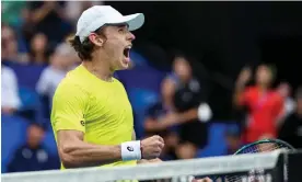  ?? ?? Australia's Alex de Minaur celebrates winning his men's singles match against USA's Taylor Fritz at the United Cup tennis tournament in Perth. Photograph: Colin Murty/AFP/ Getty Images