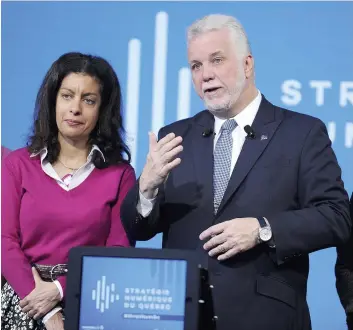  ?? PHOTO STEVENS LEBLANC ?? La ministre de l’économie Dominique Anglade et le premier ministre québécois Philippe Couillard lors du dévoilemen­t de la stratégie numérique du Québec, hier.