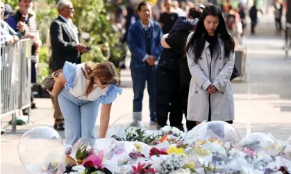  ?? Photograph: Brendon Thorne/Getty Images ?? People lay flowers outside the Bondi Junction shopping mall in Sydney after the mass stabbing carried out by Joel Cauchi, who had a diagnosed mental illness since the age of 17, reportedly schizophre­nia.