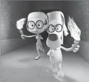  ?? SHERMAN,
DreamWorks Animation ?? left, voiced by Max Charles, and Mr. Peabody, voiced by Ty Burell, in the DreamWorks Animation film “Mr. Peabody & Sherman.”
