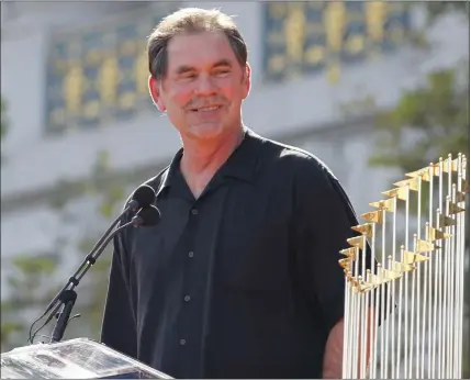  ?? STAFF ARCHIVES ?? Bruce Bochy has the World Series trophy by his side as he speaks to giddy fans at a rally at the Civic Center following the Giants’ ticker tape parade through downtown in November, 2010. The title was the Giants’ first in San Francisco and first of three over the span of five years.