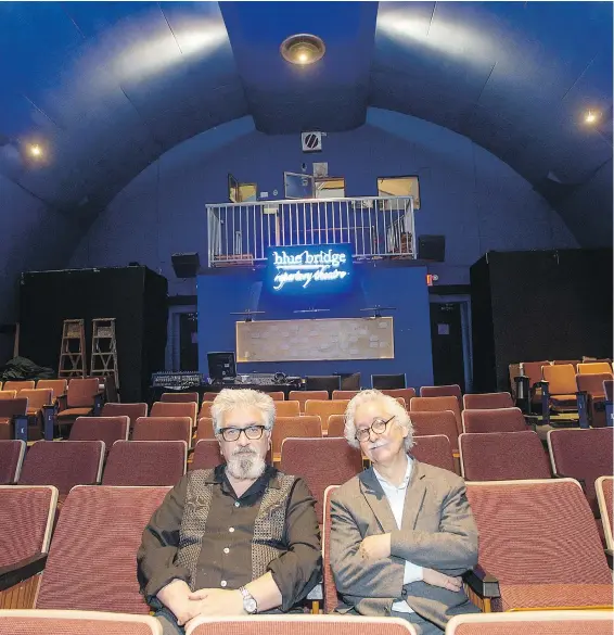  ??  ?? Blue Bridge Repertory Theatre director Brian Richmond, left, and musical director Chris Donison at the Roxy Theatre.