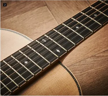  ?? ?? 2 2. Fretboards are ebony, a traditiona­l option for acoustic guitars, with mahogany for the necks