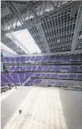  ?? AP ?? A portion of the roof is darkened with curtains as U.S. Bank Stadium in Minneapoli­s.