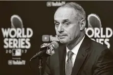  ?? KarenWarre­n / Staff photograph­er ?? Commission­er Rob Manfred has taken from the Astros this year and given to them in the form of an expanded playoff field.