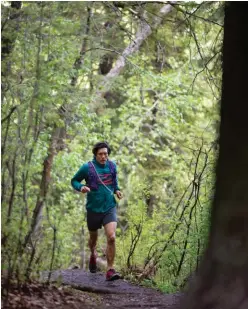  ??  ?? OPPOSITE TOP Tim Banfield running in Fish Creek Park OPPOSITE BOTTOM Banfield in Nosehill Park
BELOW Kylee Toth on the Douglas Fir Trail in Edworthy Park