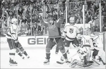  ?? Al Drago Associated Press ?? ALEX OVECHKIN of Washington celebrates after assisting on a second-period goal that gave the Capitals a 4-3 lead Monday. Ovechkin notched his 38th goal of the season on a power play in the first.