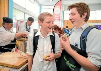  ?? PHOTO: SUPPLIED ?? Waiopehu College students Alexander Beckwith, left, and Brayden Elmaz, both 14, try handmade pasta and Levin-made Genoese pesto.