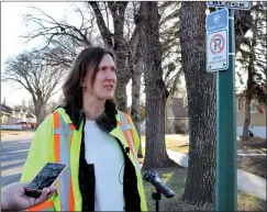  ?? HERALD PHOTO BY ALEJANDRA PULIDO-GUZMAN ?? Transporta­tion operations manager Juliane Ruck talks to reporters on Monday along 2 Avenue North about the City’s snow route feedback survey launch.